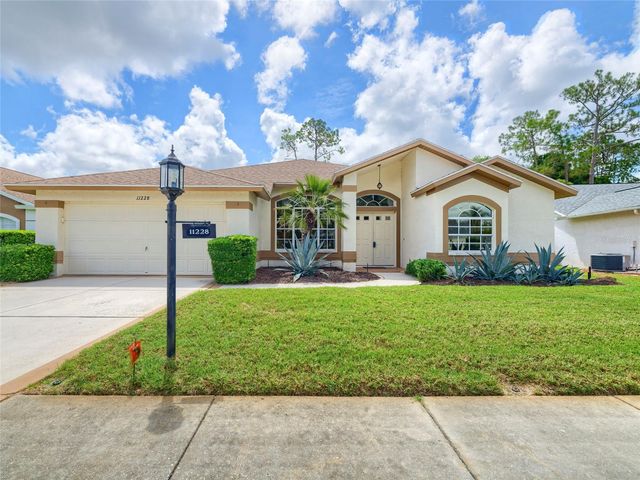11228 WINDRUSH CIRCLE, Hudson, FL 34667
