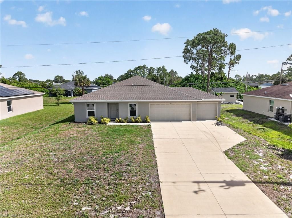 3014 38th ST SW, LEHIGH ACRES, FL 33976 — photo 4