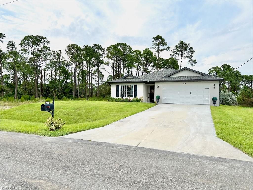 3214 68th ST W, LEHIGH ACRES, FL 33971 — photo 2