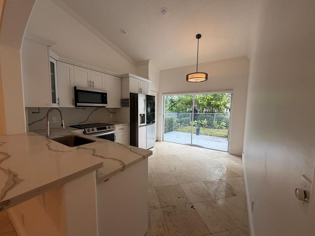 7657 Sanctuary Drive, Coral Springs, FL 33065