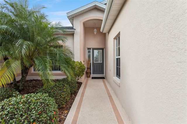 4803 SAWGRASS LAKE CIRCLE, Leesburg, FL 34748