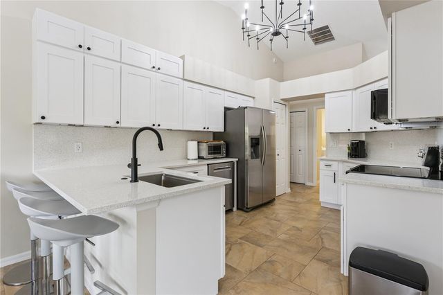 4803 SAWGRASS LAKE CIRCLE, Leesburg, FL 34748