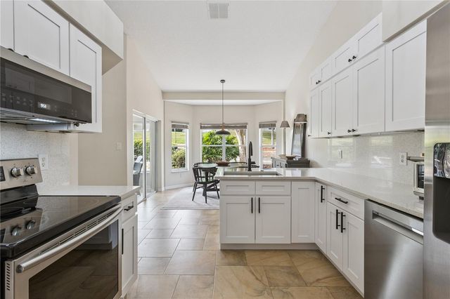 4803 SAWGRASS LAKE CIRCLE, Leesburg, FL 34748