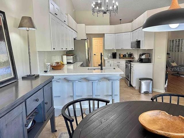 4803 SAWGRASS LAKE CIRCLE, Leesburg, FL 34748