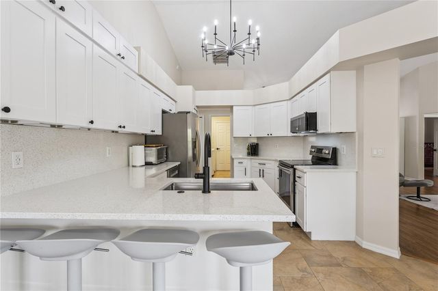 4803 SAWGRASS LAKE CIRCLE, Leesburg, FL 34748