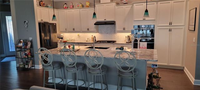 128 BALMY COAST ROAD, Groveland, FL 34736