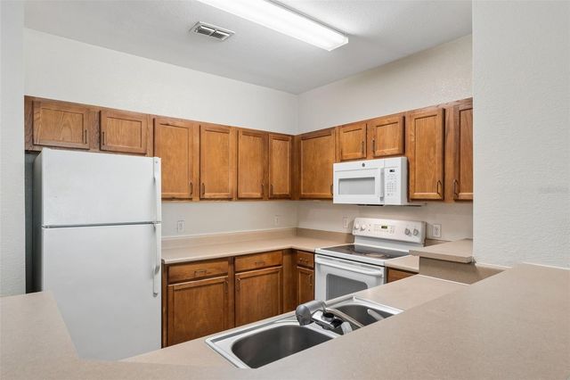 8136 CLAIRE ANN DRIVE 207, Orlando, FL 32825