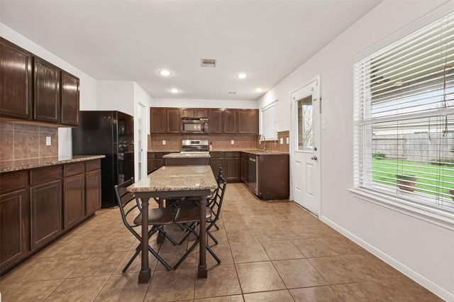 8115 Sweetstone Bluff Lane, Cypress, TX 77433