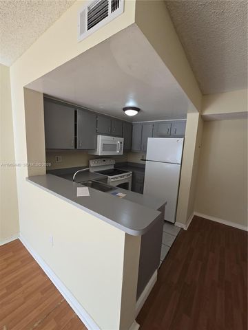 670 NW 85th Pl 11-210, Miami, FL 33126