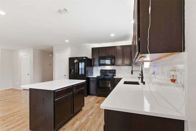 105 Honeysuckle Court, Fate, TX 75189