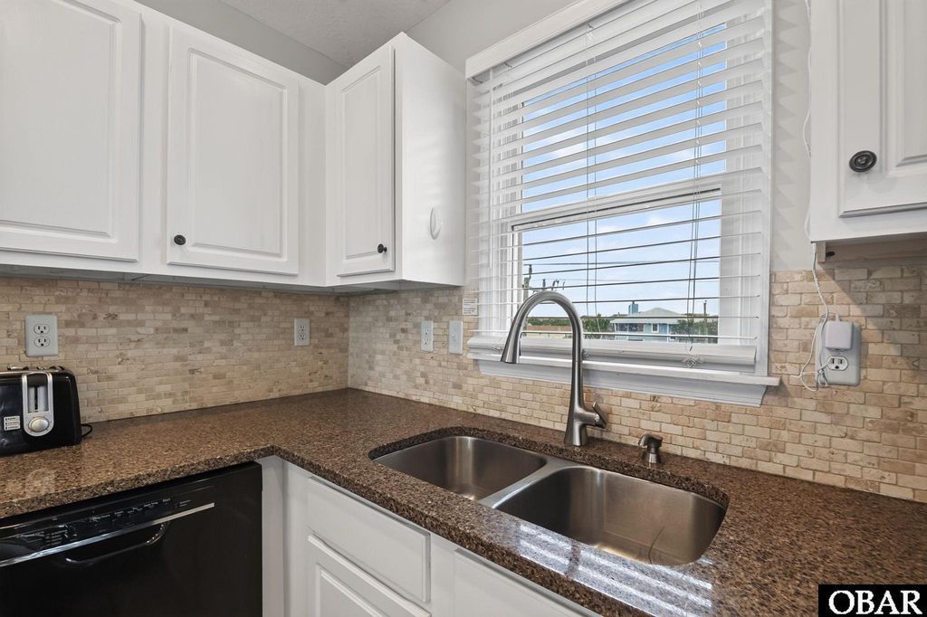 Image 5 of property listing at 115 A Ocean Bay Boulevard, Duck, NC 27949