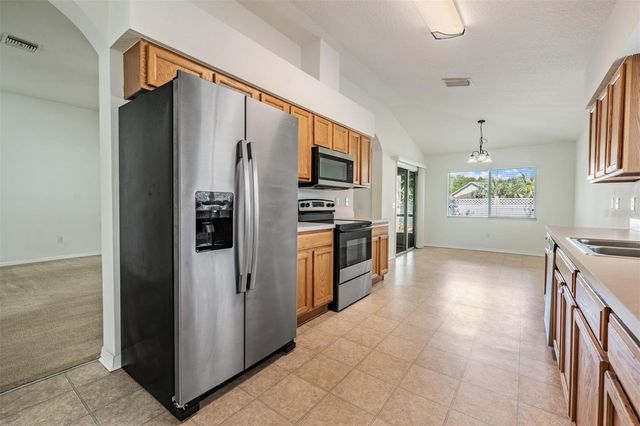 4940 WOODMERE ROAD, Land O Lakes, FL 34639