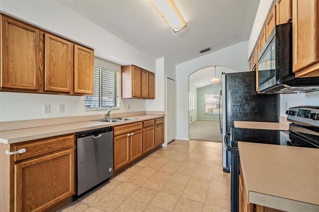 4940 WOODMERE ROAD, Land O Lakes, FL 34639