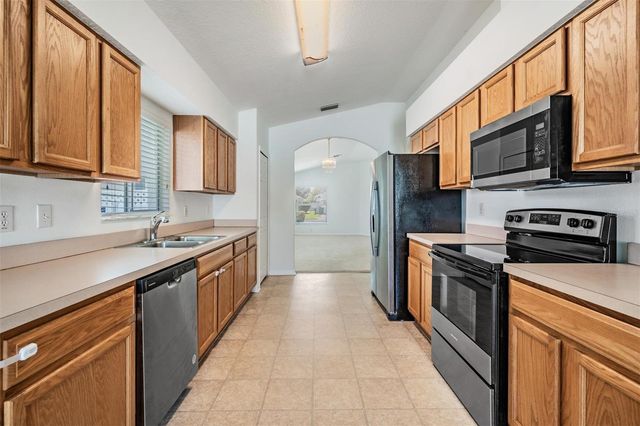 4940 WOODMERE ROAD, Land O Lakes, FL 34639