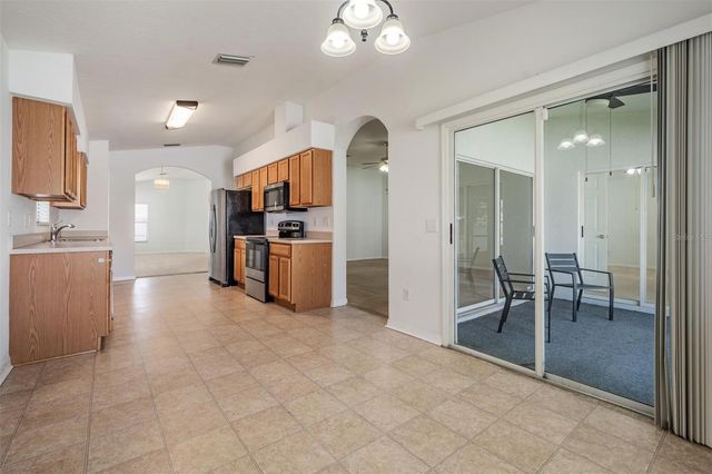 4940 WOODMERE ROAD, Land O Lakes, FL 34639