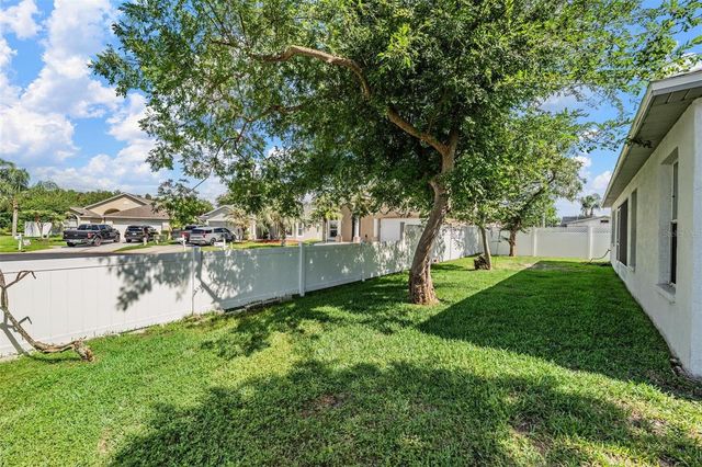 4940 WOODMERE ROAD, Land O Lakes, FL 34639