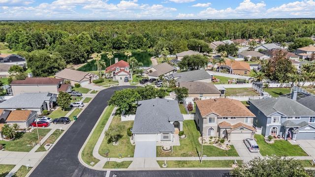 4940 WOODMERE ROAD, Land O Lakes, FL 34639