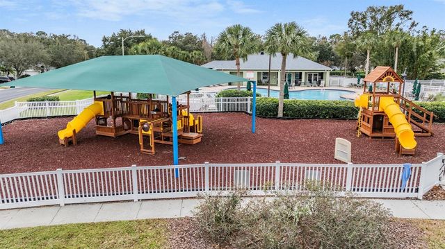 4940 WOODMERE ROAD, Land O Lakes, FL 34639