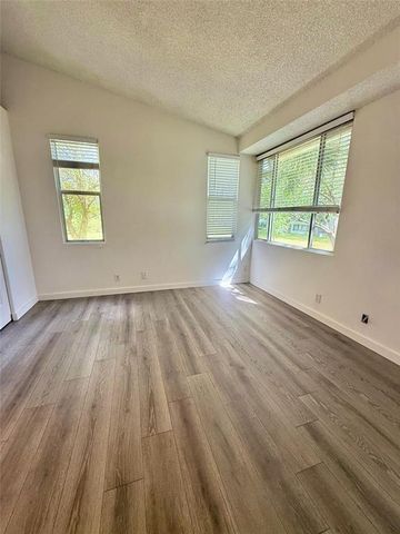 741 Lyons Rd 17207, Coconut Creek, FL 33063