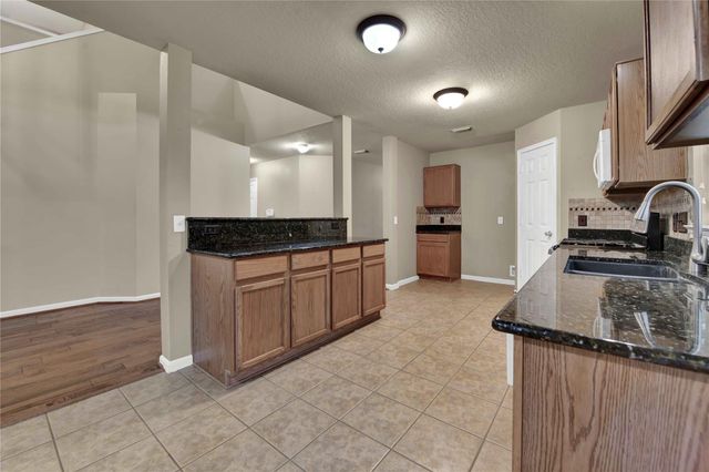 2706 Woodspring Forest Drive, Houston, TX 77345