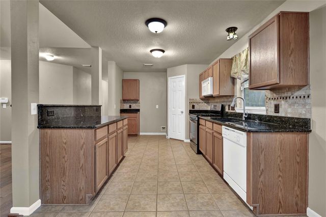 2706 Woodspring Forest Drive, Houston, TX 77345