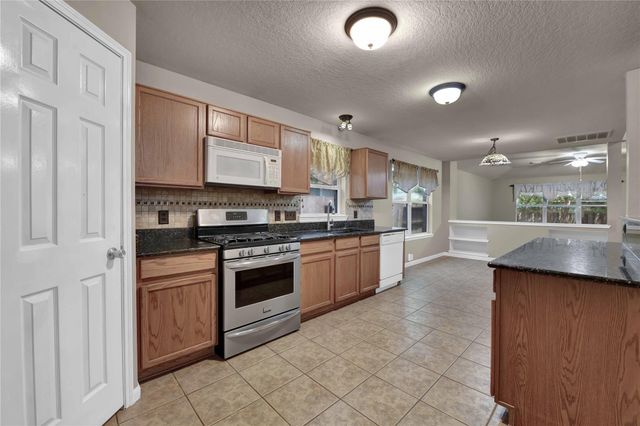 2706 Woodspring Forest Drive, Houston, TX 77345