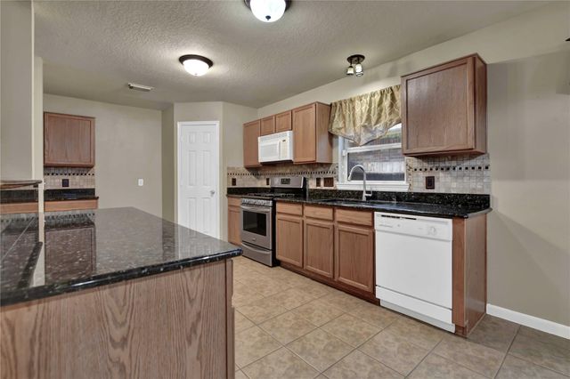 2706 Woodspring Forest Drive, Houston, TX 77345