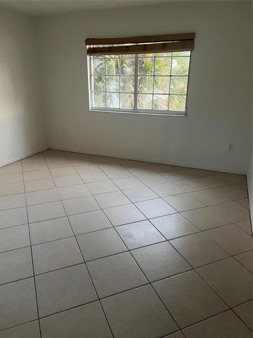 5031 Wiles Road 202, Coconut Creek, FL 33073