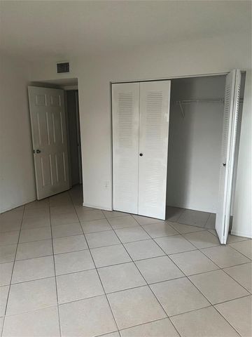 5031 Wiles Road 202, Coconut Creek, FL 33073