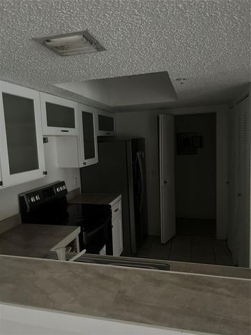 5031 Wiles Road 202, Coconut Creek, FL 33073