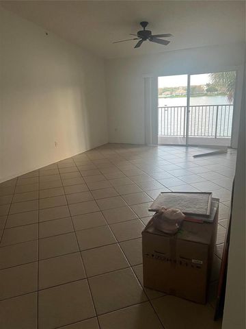 5031 Wiles Road 202, Coconut Creek, FL 33073