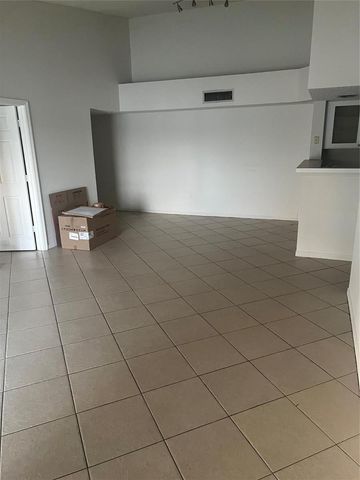 5031 Wiles Road 202, Coconut Creek, FL 33073
