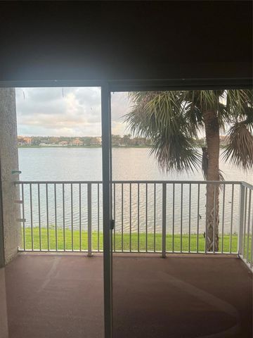 5031 Wiles Road 202, Coconut Creek, FL 33073