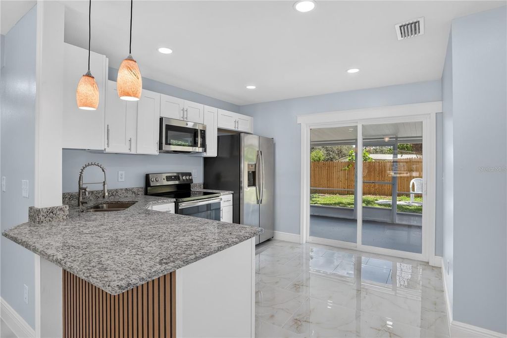 Image 6 of property listing at 10405 N 22ND STREET, Tampa, FL 33612