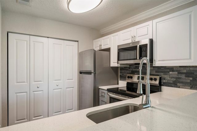2568 WOODGATE BOULEVARD 107, Orlando, FL 32822