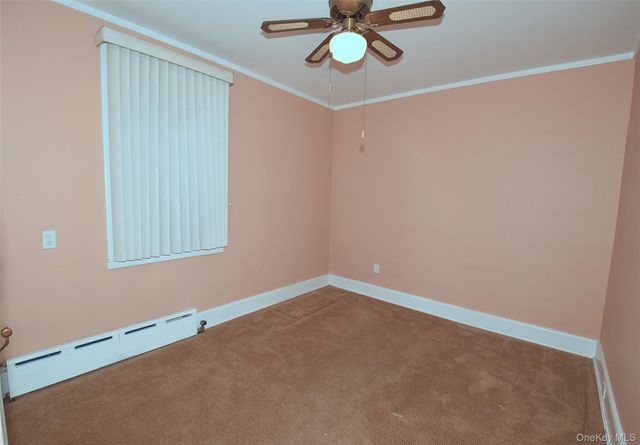 7216 66th Drive, Middle Village, NY 11379