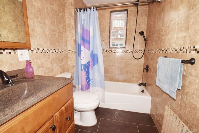 7216 66th Drive, Middle Village, NY 11379