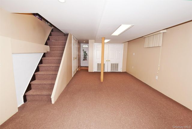 7216 66th Drive, Middle Village, NY 11379