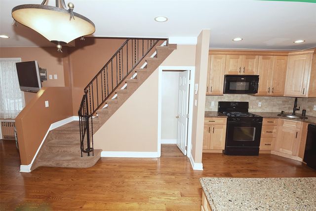 7216 66th Drive, Middle Village, NY 11379