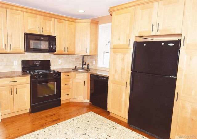 7216 66th Drive, Middle Village, NY 11379