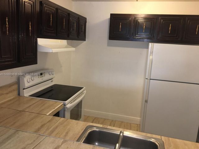 498 NW 165th St Rd D205, Miami, FL 33169