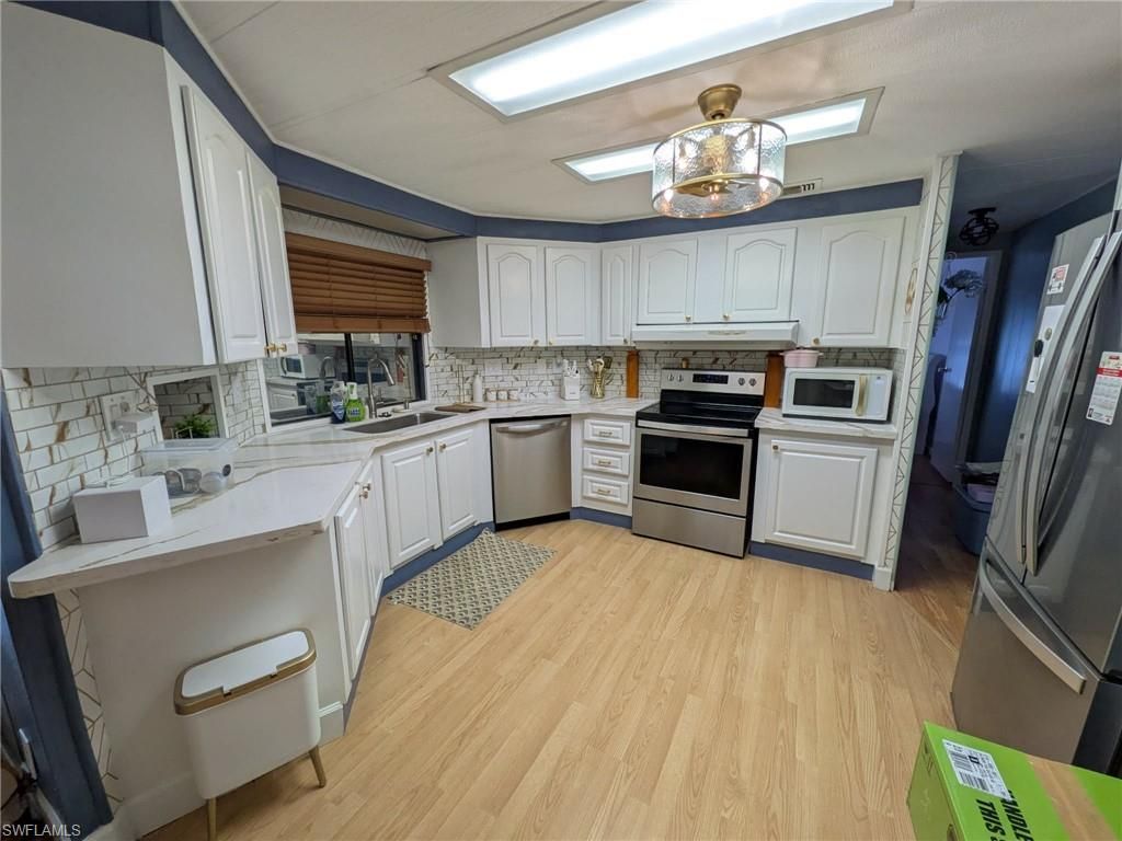 9033 Flamingo CIR, NORTH FORT MYERS, FL 33903 — photo 2