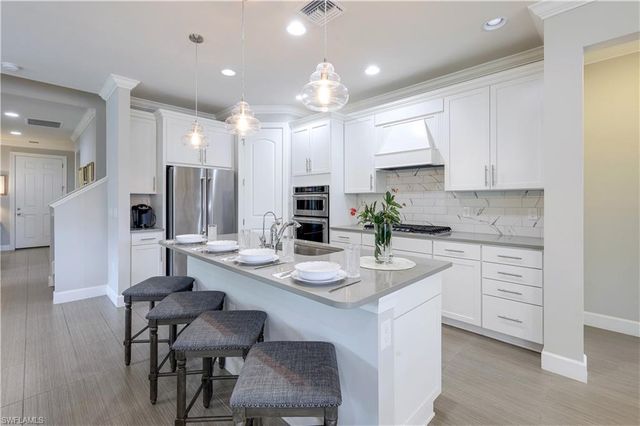 9437 Whooping Crane WAY, Naples, FL 34120