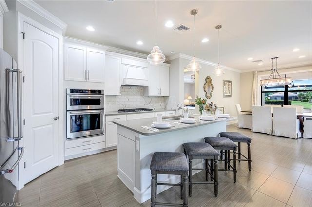 9437 Whooping Crane WAY, Naples, FL 34120