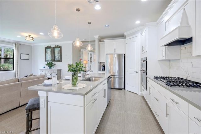 9437 Whooping Crane WAY, Naples, FL 34120