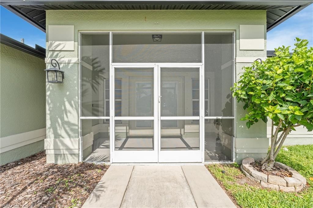 300 NW 22nd PL, CAPE CORAL, FL 33993 — photo 2