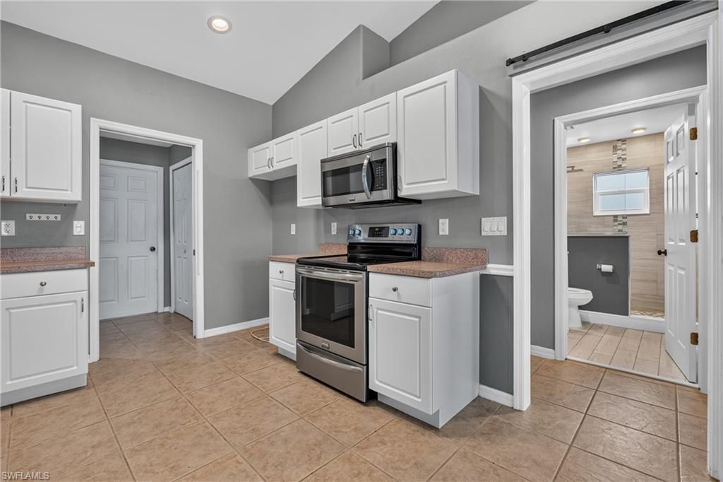 300 NW 22nd PL, CAPE CORAL, FL 33993 — photo 5