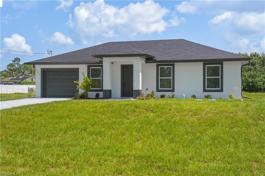 1217 Summa BLVD, LEHIGH ACRES, FL 33974 — exterior