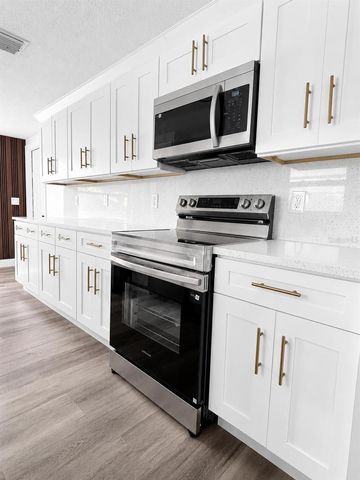 1346 CHANCELLOR DRIVE, Holiday, FL 34690