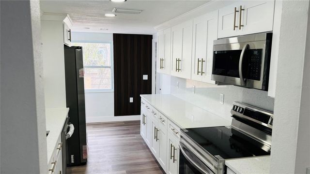 1346 CHANCELLOR DRIVE, Holiday, FL 34690